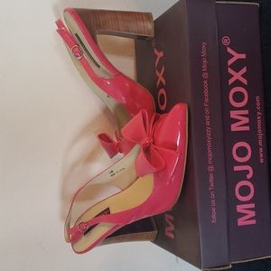 Hot pink sling back pumps
